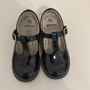 Black patent leather Mary Jane’s